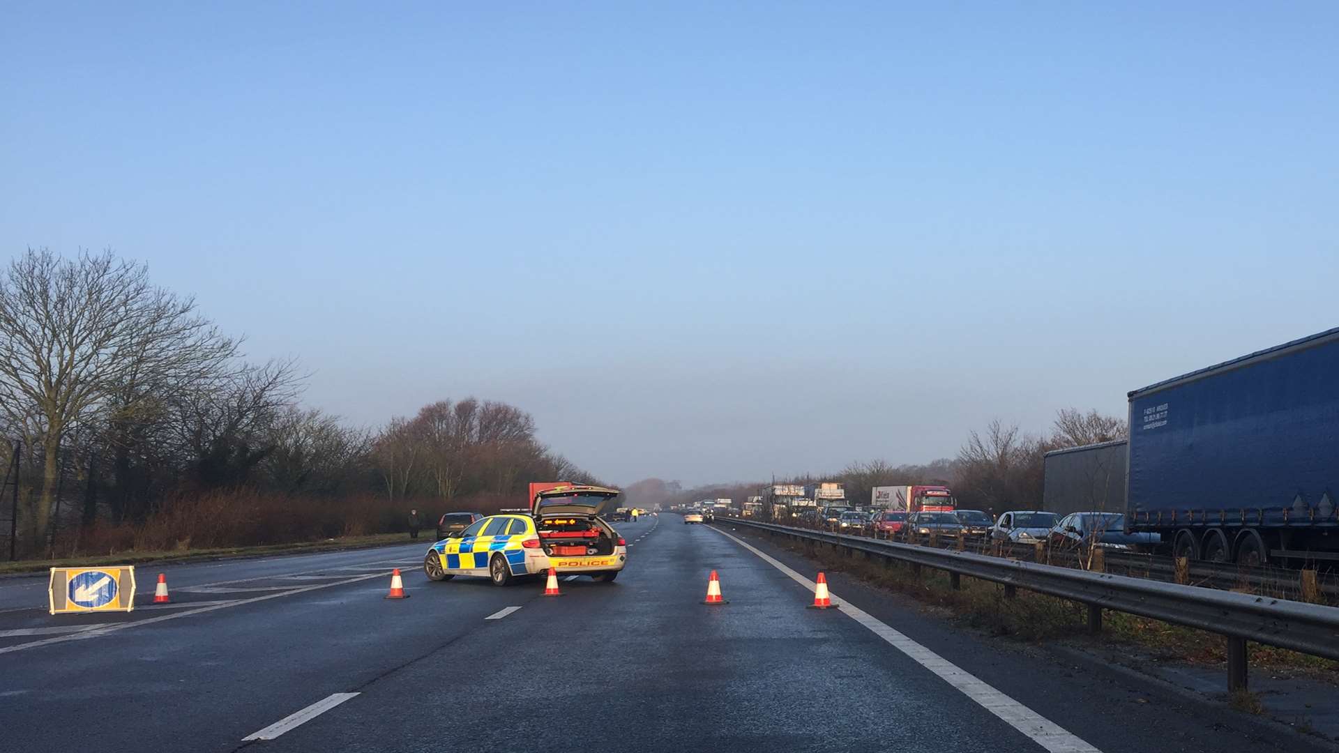 Police have closed the road in both directions