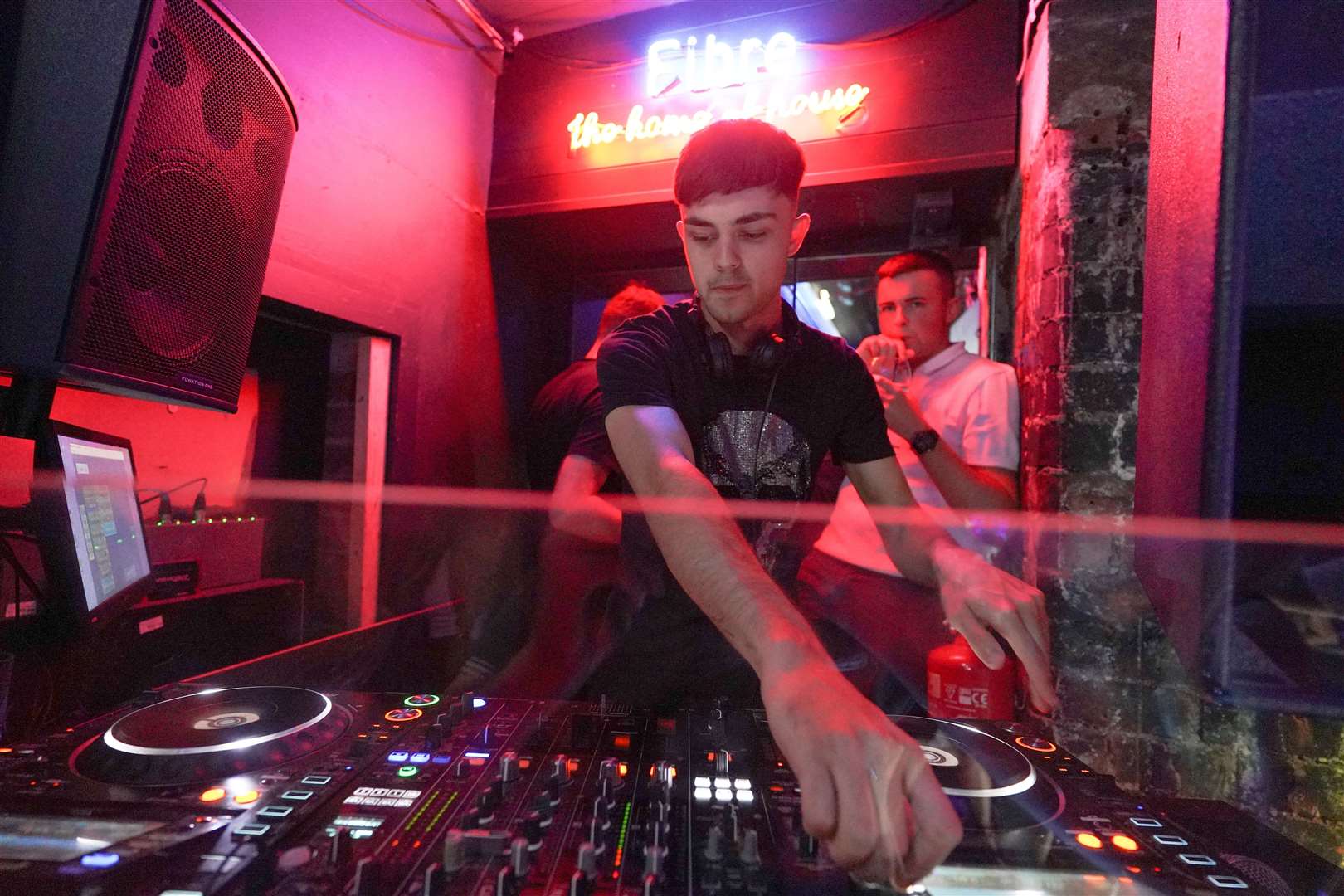 A DJ playing music at Bar Fibre in Leeds (Ioannis Alexopoulos/PA)