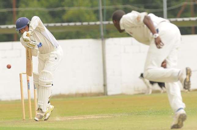 Lordswood's Zak Elkin defends against Beckenham