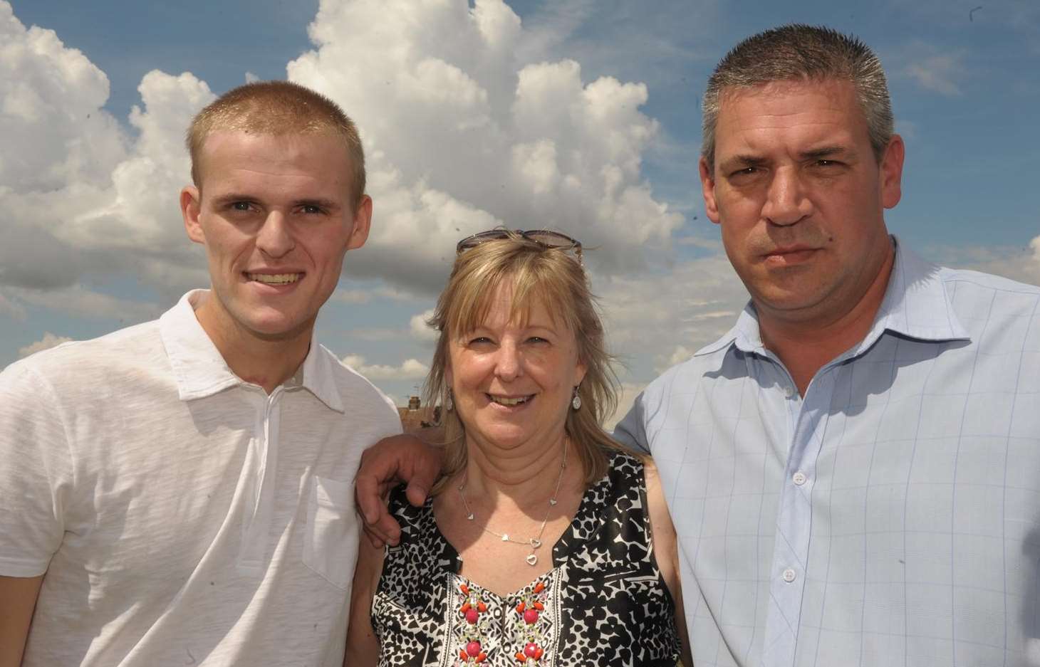 George with Parents Mark and Marion Howard. Picture: Steve Crispe