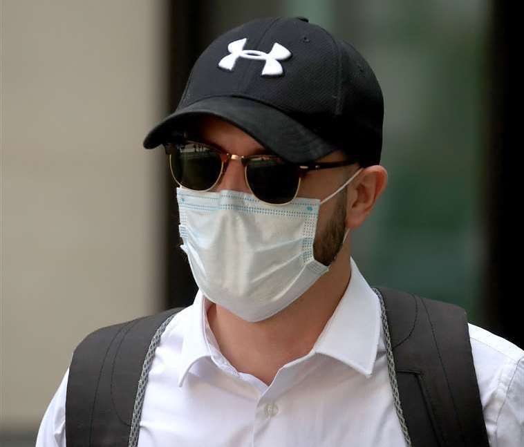 Pc Jamie Lewis arrives at Westminster Magistrates’ Court, where he was first charged with misconduct in a public office (Gareth Fuller/PA)