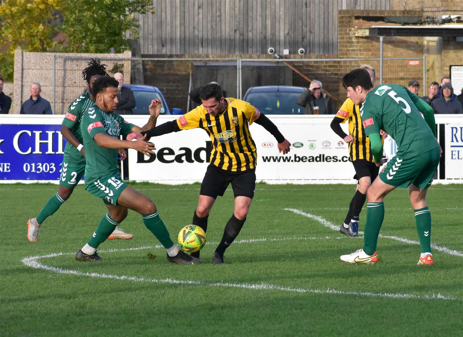 Ian Draycott in a midfield battle for Folkestone Invicta Picture: Randolph File