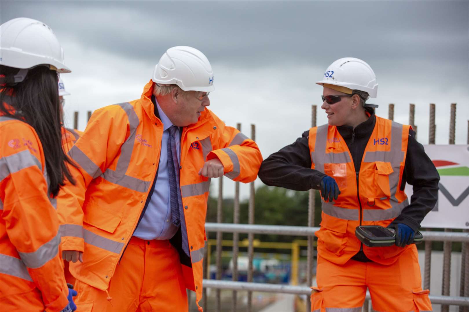 Prime Minister Boris Johnson greets a worker during a visit to the HS2 Solihull Interchange building site in the West Midlands (Andrew Fox/Daily Telegraph/PA)