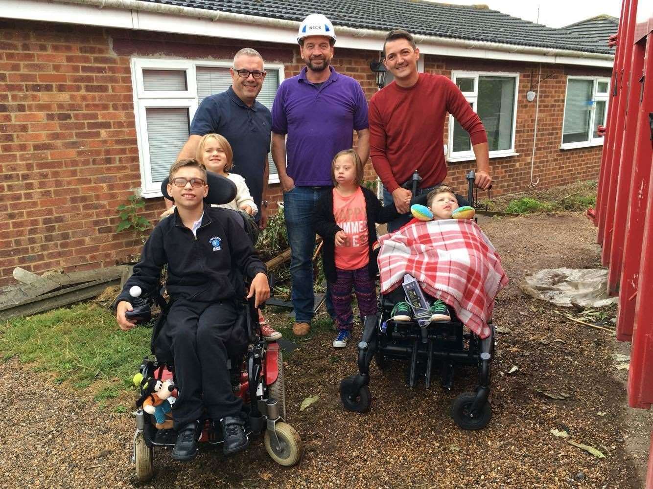 The Ratcliffe family with DIY SOS presenter Nick Knowles