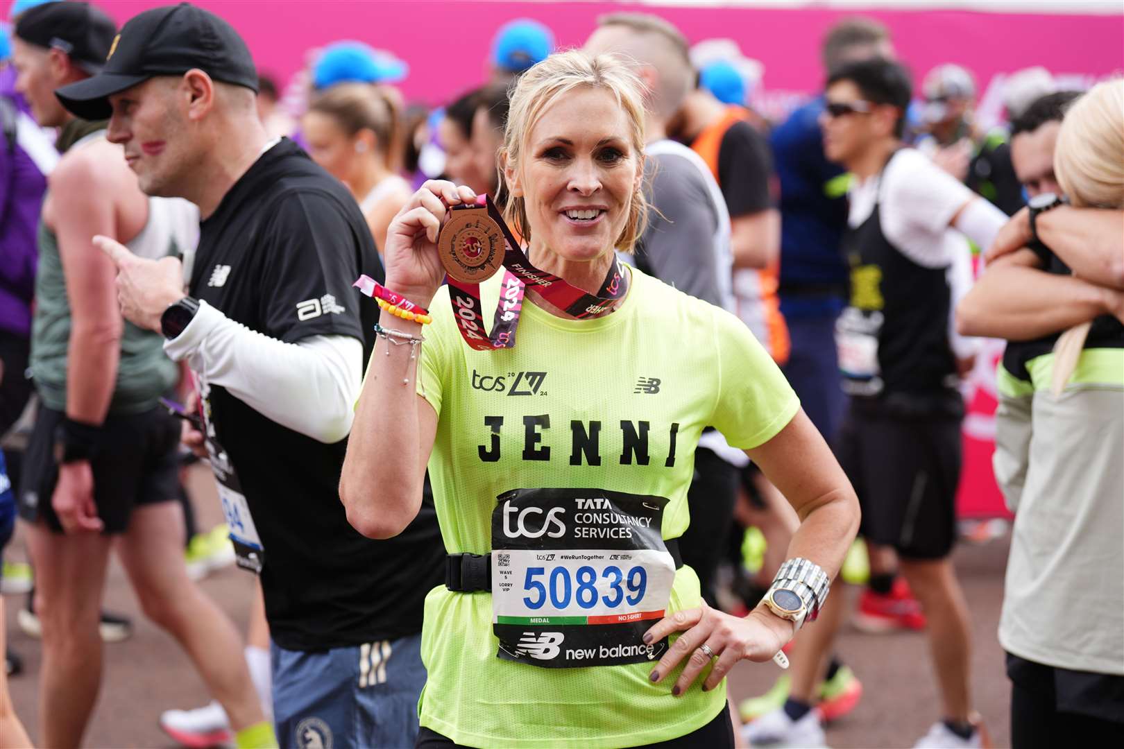 Jenni Falconer after finishing the TCS London Marathon (John Walton/PA)