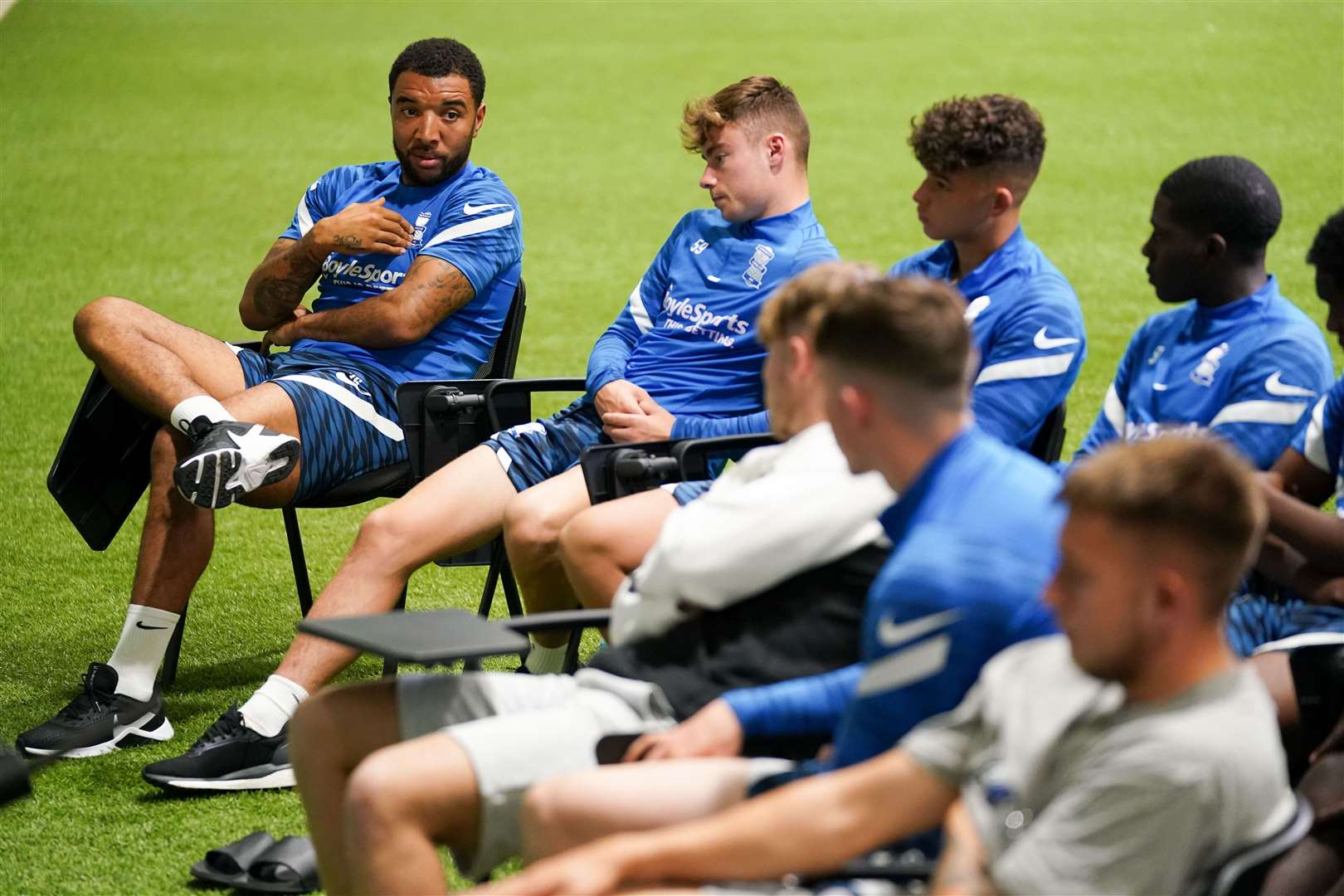 Deeney (left) speaks to players during the talk (Jacob King/PA)