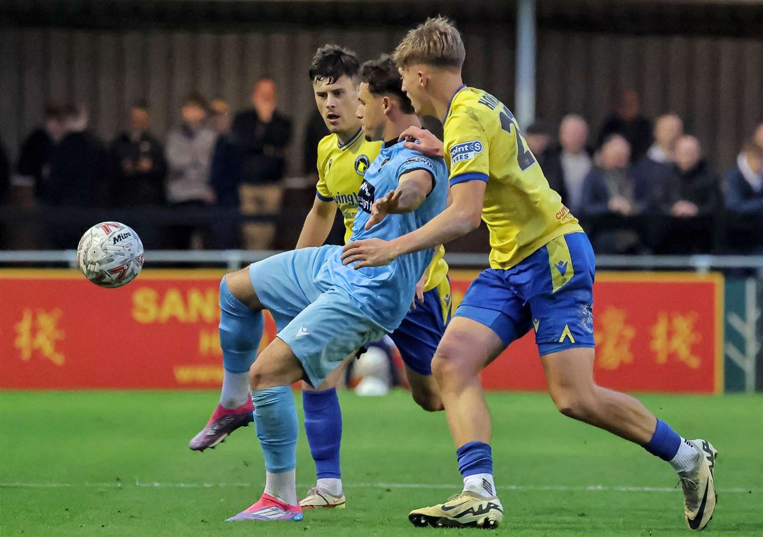 Charlie Seaman helps the ball on in midfield during Maidstone's FA Cup defeat. Picture: Helen Cooper