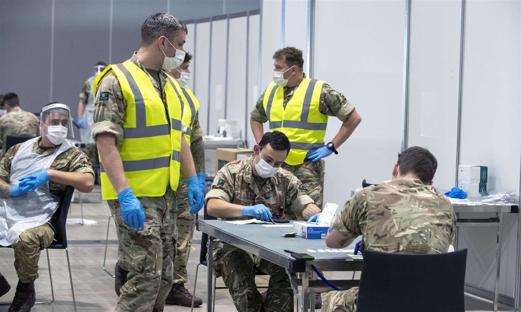 Soldiers at The Exhibition Centre in Liverpool, which has been set up as a testing centre (Peter Byrne/PA)