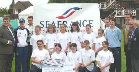 Kent's under-13 squad with, far left, SeaFrance sales director Bill Laidlaw and Kent and England cricketer Lydia Greenway. Far right, The Mote and Kent cricketer Moira Comfort, Kent Cricket Board director of cricket development Jamie Clifford, and KCB cricket development officer David Sear. Picture: STEVE CONSTABLE