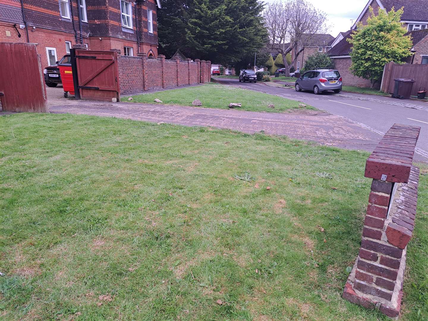 The green verge in front of The Vale would be turned into parking