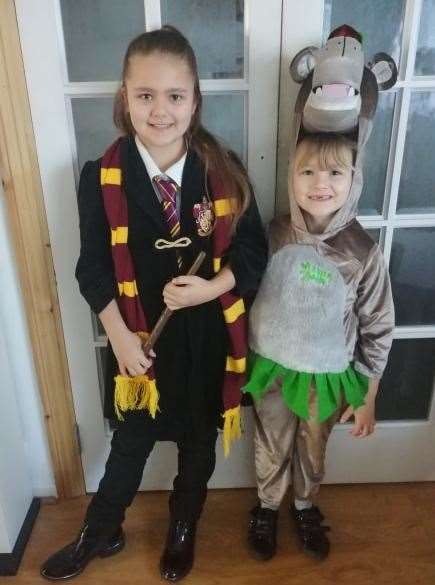 Daisy Humphrey, nine with her sister Millie, six as Hermione and Baloo, they both go to Warren Wood Primary School in Rochester