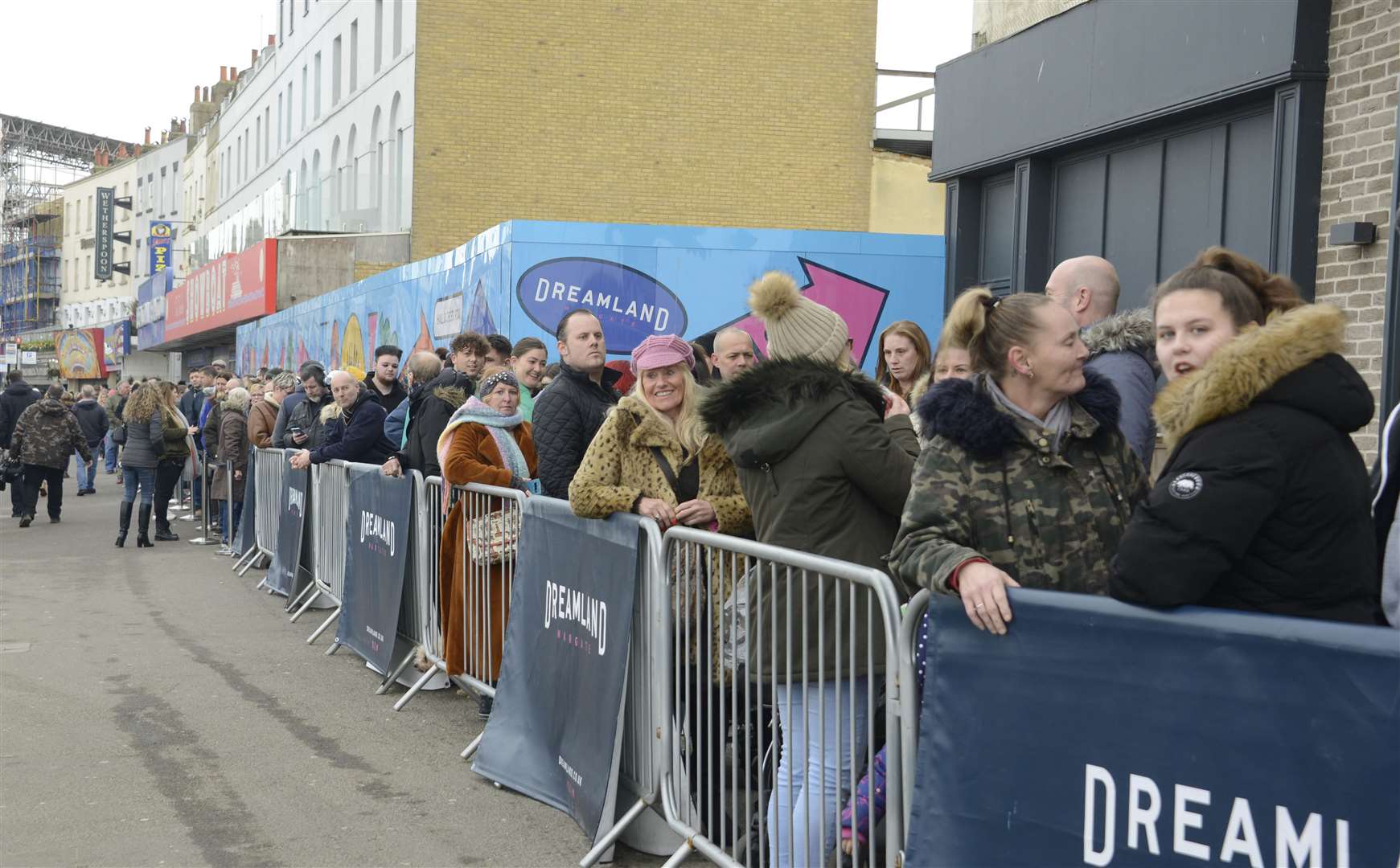 The queue for free tickets stretched along the seafront Picture: Paul Amos. (27193186)