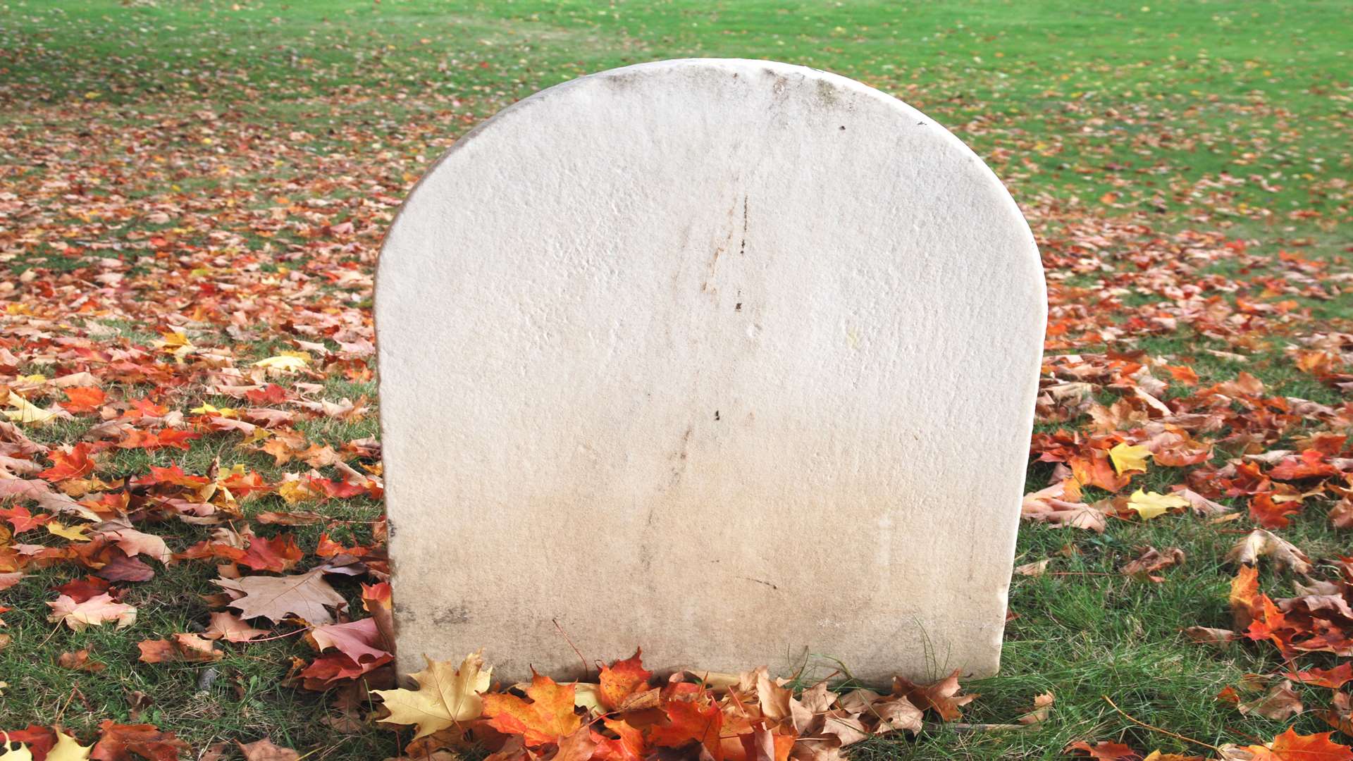 Several gravestones have been damaged. Stock image