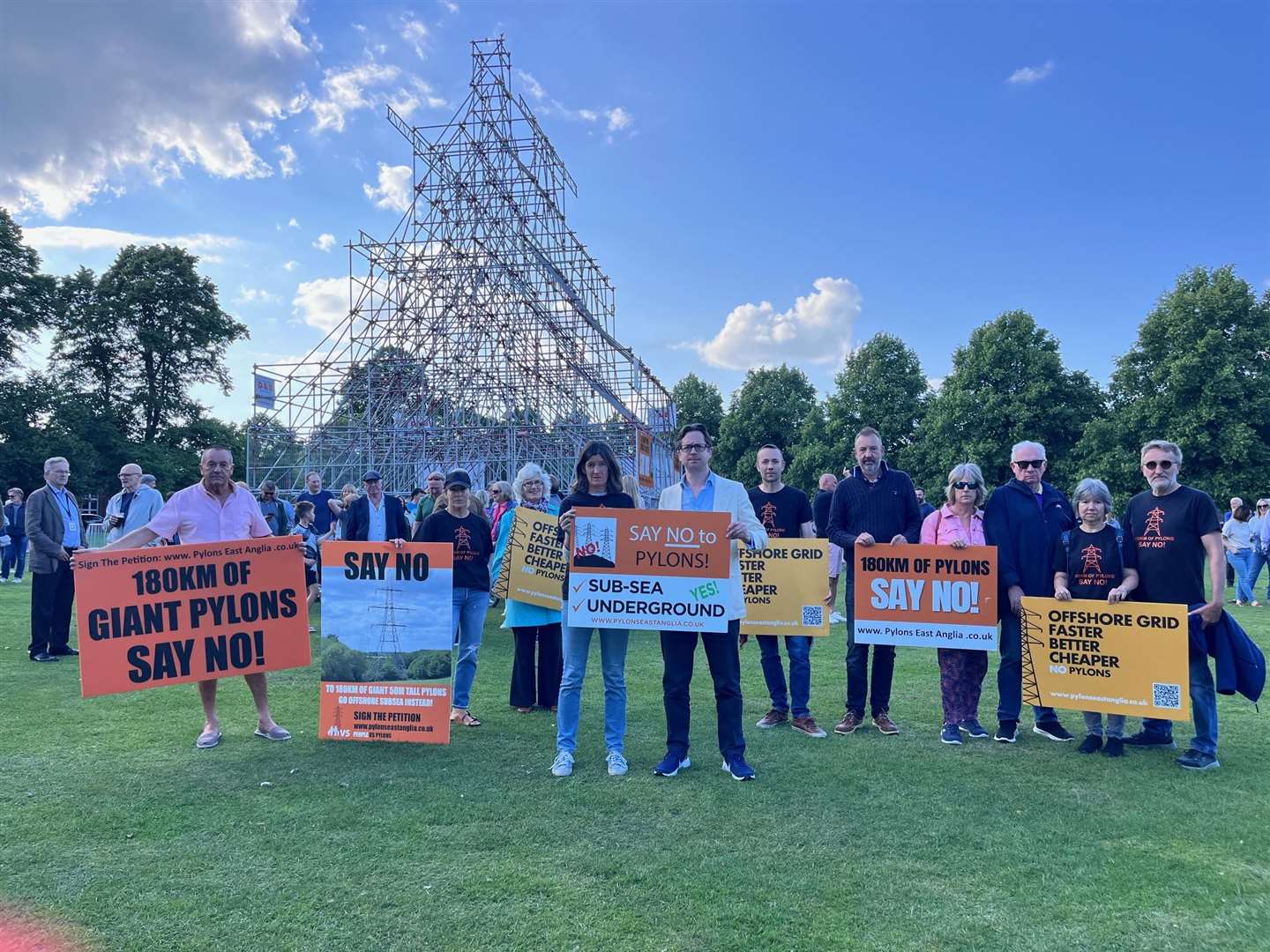 Anti-pylon protesters in Essex with local MP Alex Burghart (Rosie Pearson/PA)