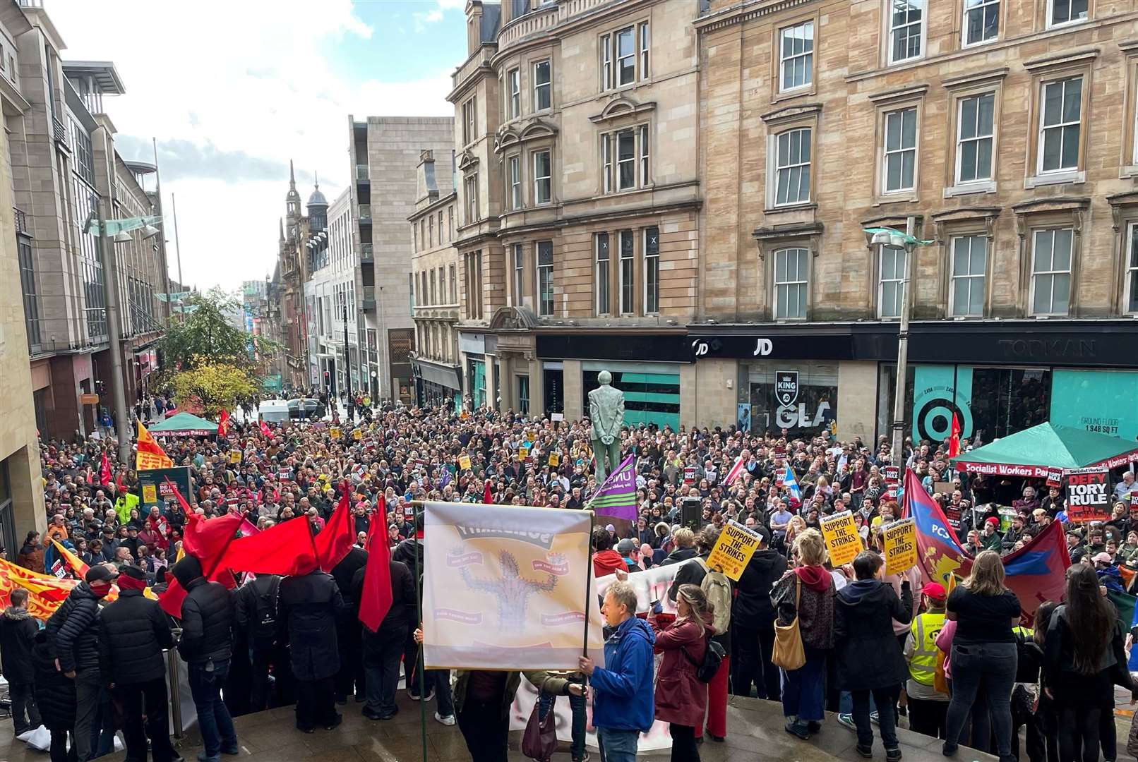 People take part in an Enough is Enough rally in Glasgow (Lauren Gilmour/PA)