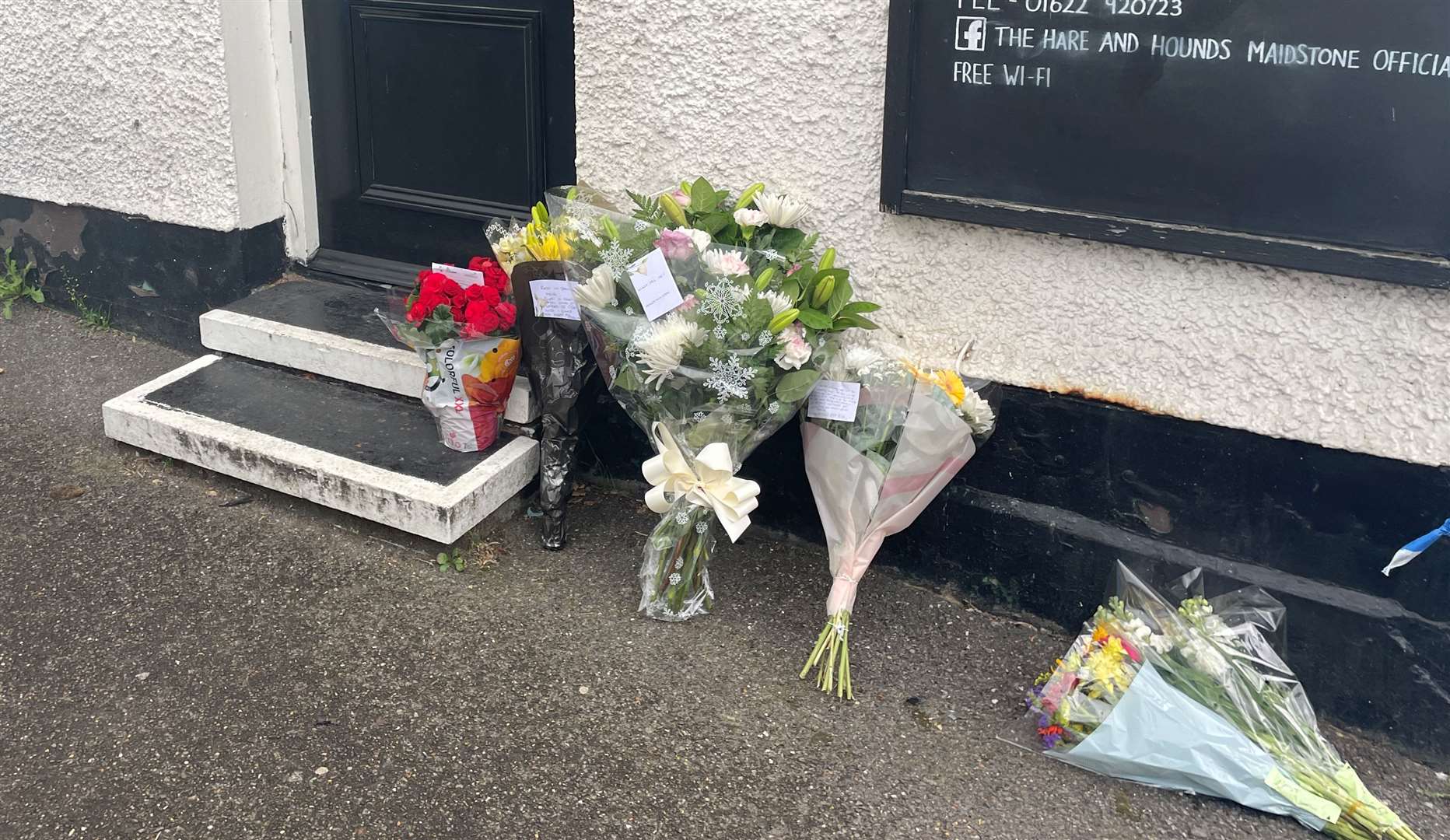 Floral tributes left at the pub after landlord Matthew Bryant died