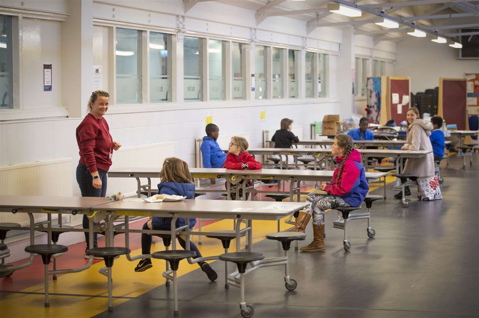 Children comply with social distancing rules while attending a hub school in Edinburgh during lockdown (PA)