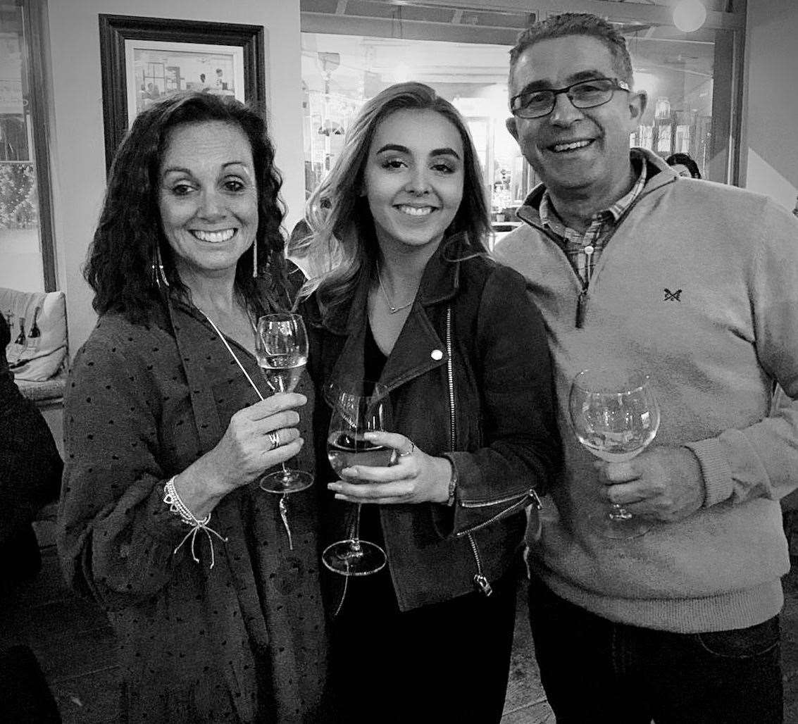 Helen and Jon Sutton with their daughter Harriet who has loved growing up at the pub