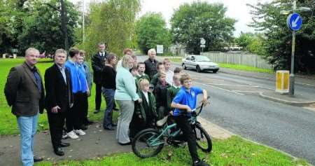 Cllr Dave Smith and Cllr John Balcombe, right, with families in Station Road, Aylesford