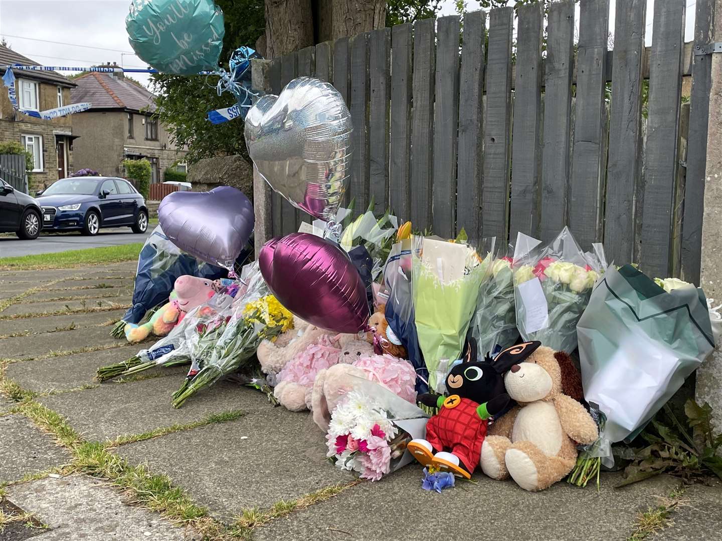 Flowers and tributes were left near the scene following the fire in August (Dave Higgins/PA)