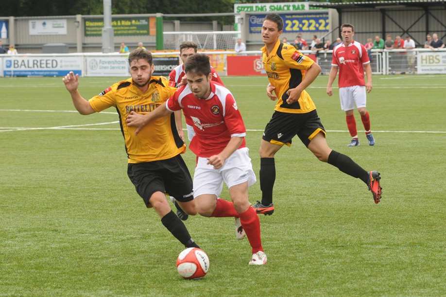 Ebbsfleet trialist Cesc Fakinos looks to go past Maidstone's Alex Brown