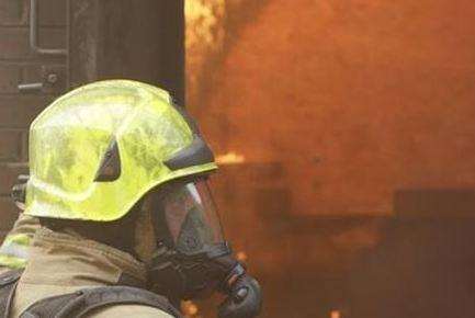 Crew used breathing apparatus to tackle the fire. Stock image.