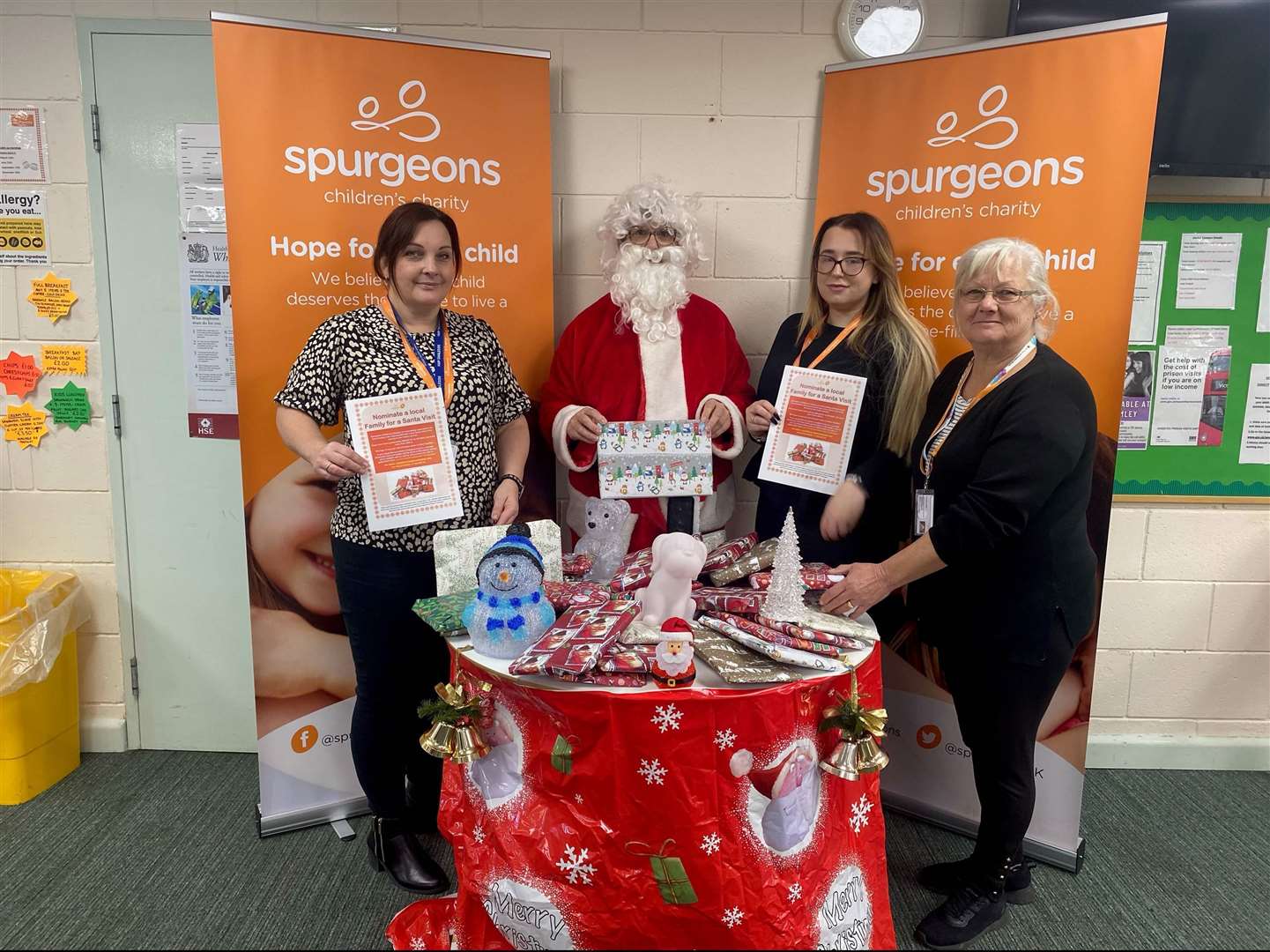 Lisa Langworthy, Emma Allcorn and Pauline Neal with Linda Jeacock dressed as Santa, of children’s charity Spurgeons, who are offering free visits to families having a hard time