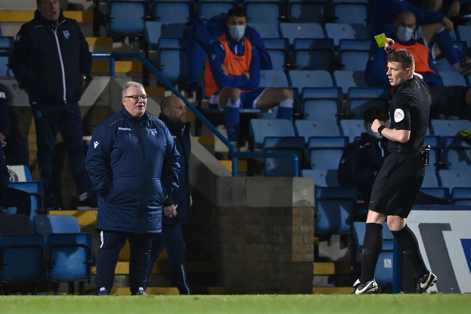 Gillingham manager Steve Evans is booked by the referee for his protests Picture: Keith Gillard