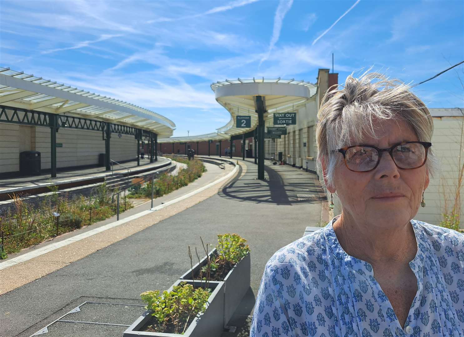 Deborah, of Hythe, at the former Folkestone harbour station - where she remembers catching a ferry as a child