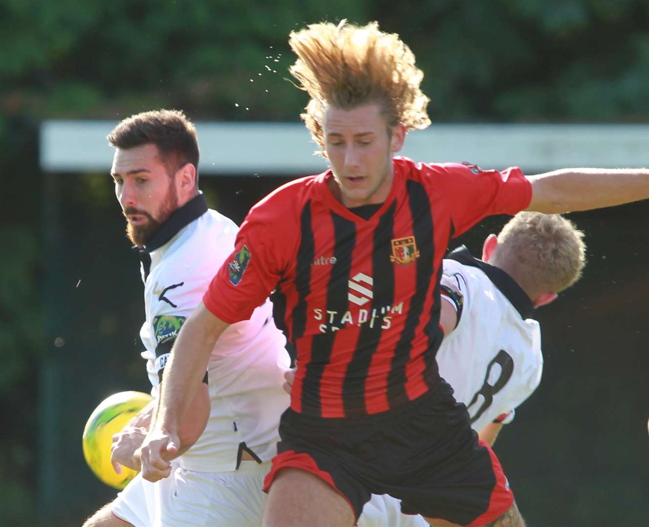 Tommie Fagg in action for Sittingbourne against Ramsgate before seeing red Picture: John Westhrop