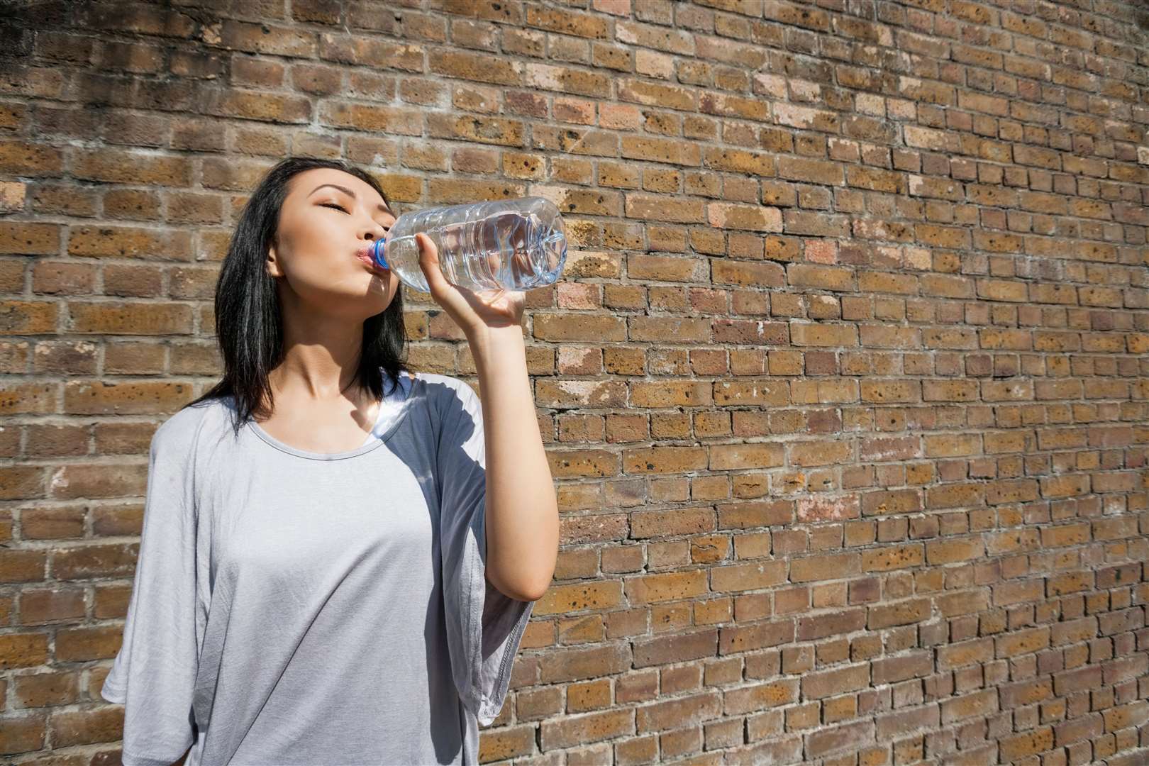 The research supports evidence that people living in hot countries do need to drink more (Alamy/PA)