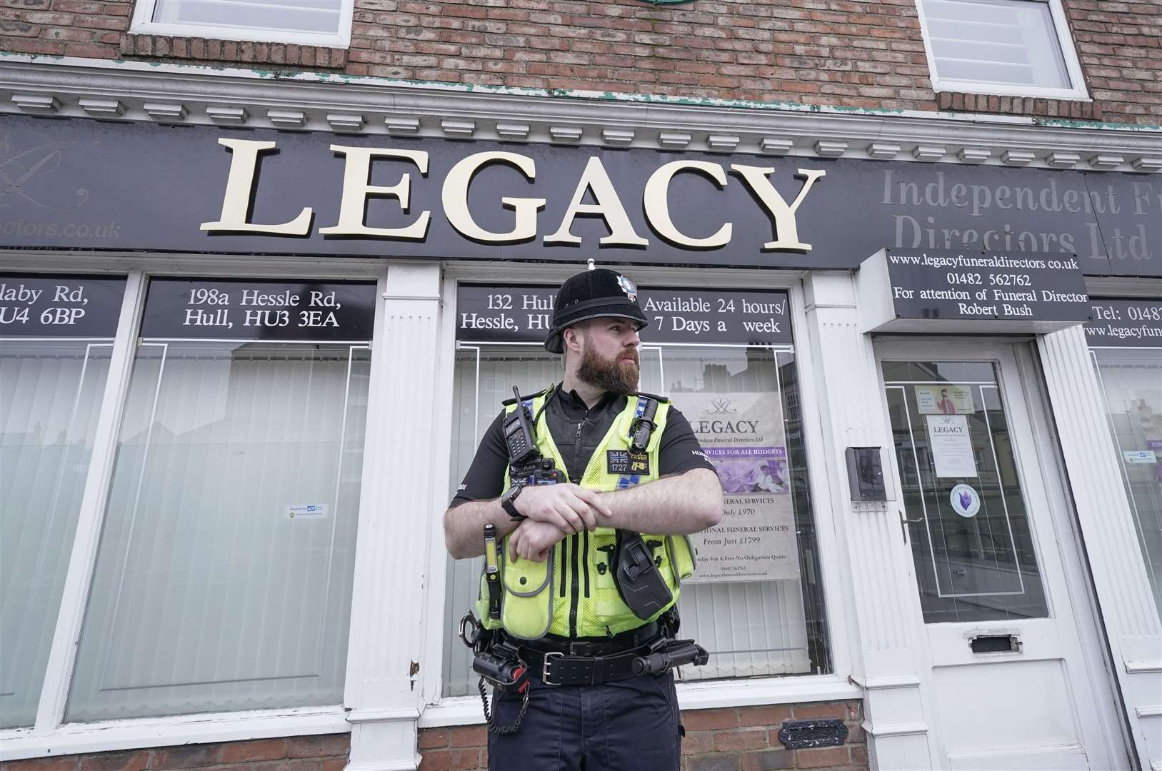 Police outside the Beckside branch of Legacy Independent Funeral Directors in Hull (Danny Lawson/PA)