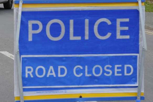 Police closed the road following the crash