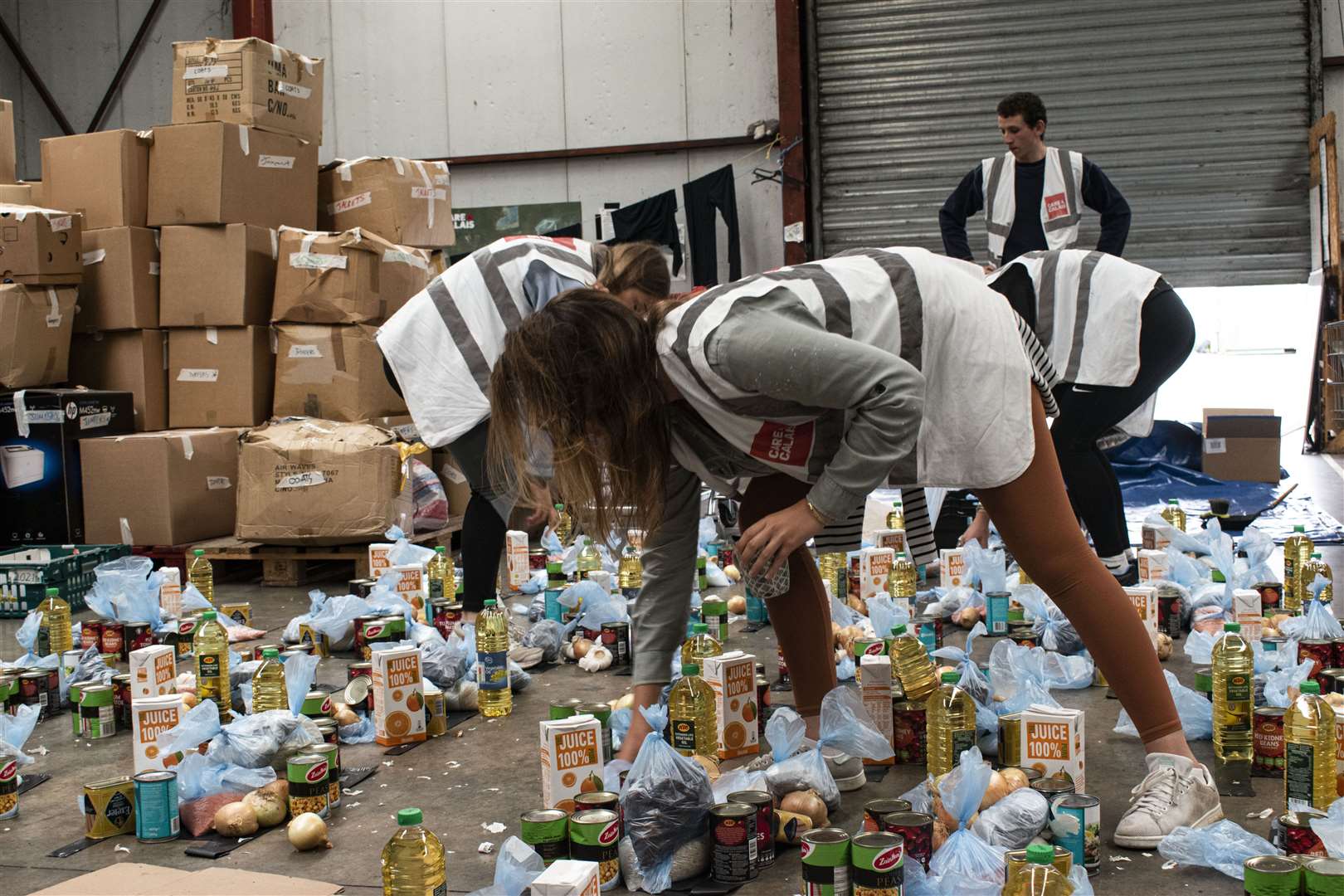 Workers for the Care4Calais charity (Charlie Ermine/PA)