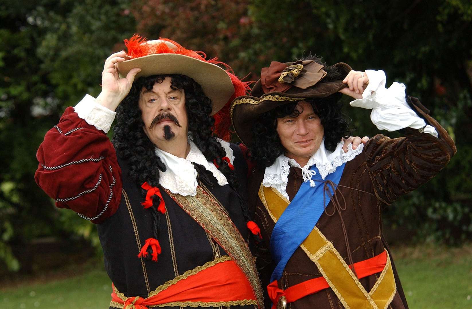 John Savident, left, with Steven Arnold who played Fred’s son Ashley Peacock in Coronation Street (PA)