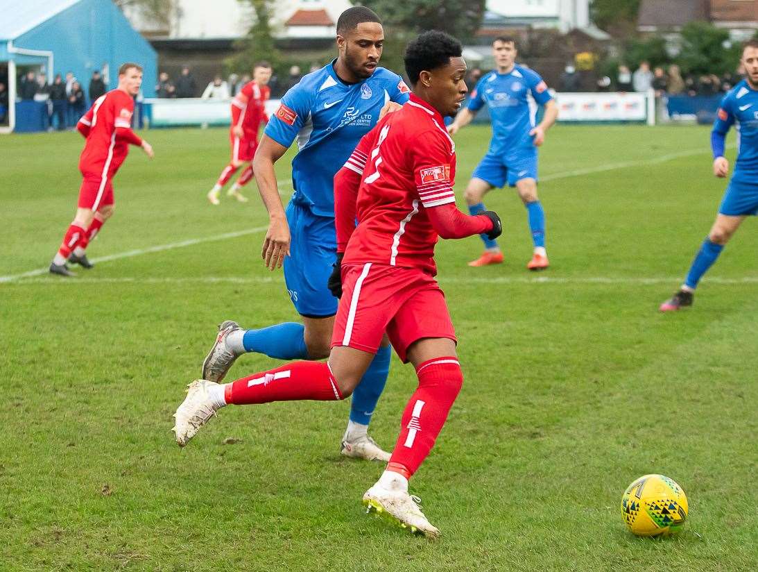 Whitstable's Stephen Okoh speeds down the wing during their 7-2 defeat at Herne Bay. Picture: Les Biggs