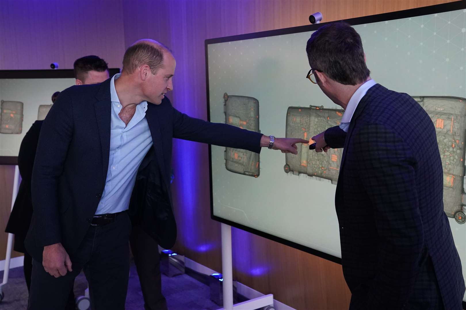 William looks for ivory hidden in a suitcase on a scan during a visit to Microsoft HQ (Steve Parsons/PA)