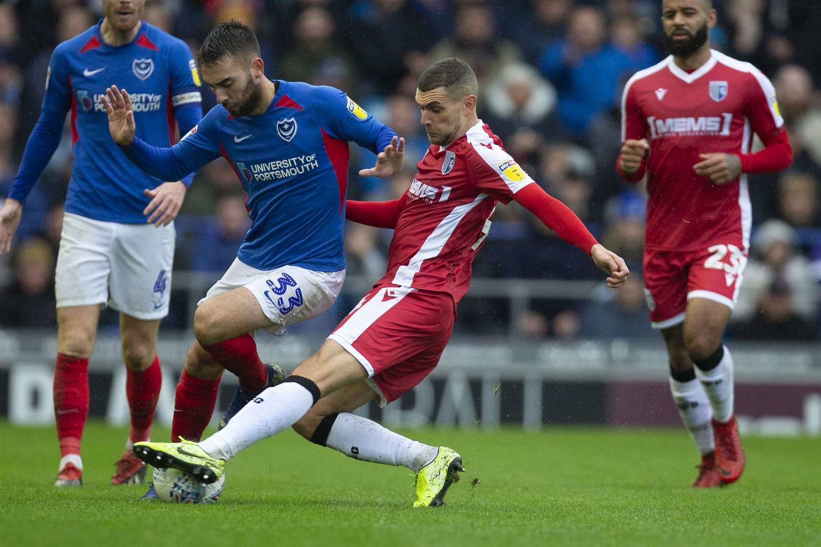 Stuart O'Keefe gets in a challenge for the Gills at Portsmouth Picture: Kent Pro Images (19180333)