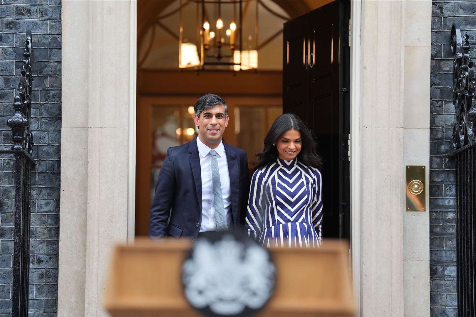 Rishi Sunak with his wife outside Downing Street (James Manning/PA)