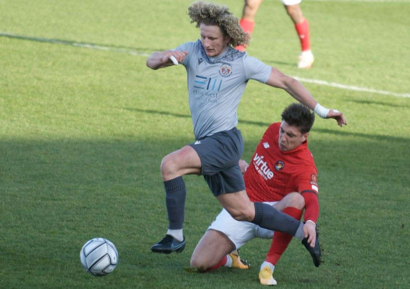 Fleet's Adam Mekki comes up against Slough midfielder Aaron Kuhl. Picture: Ed Miller/EUFC (54854038)