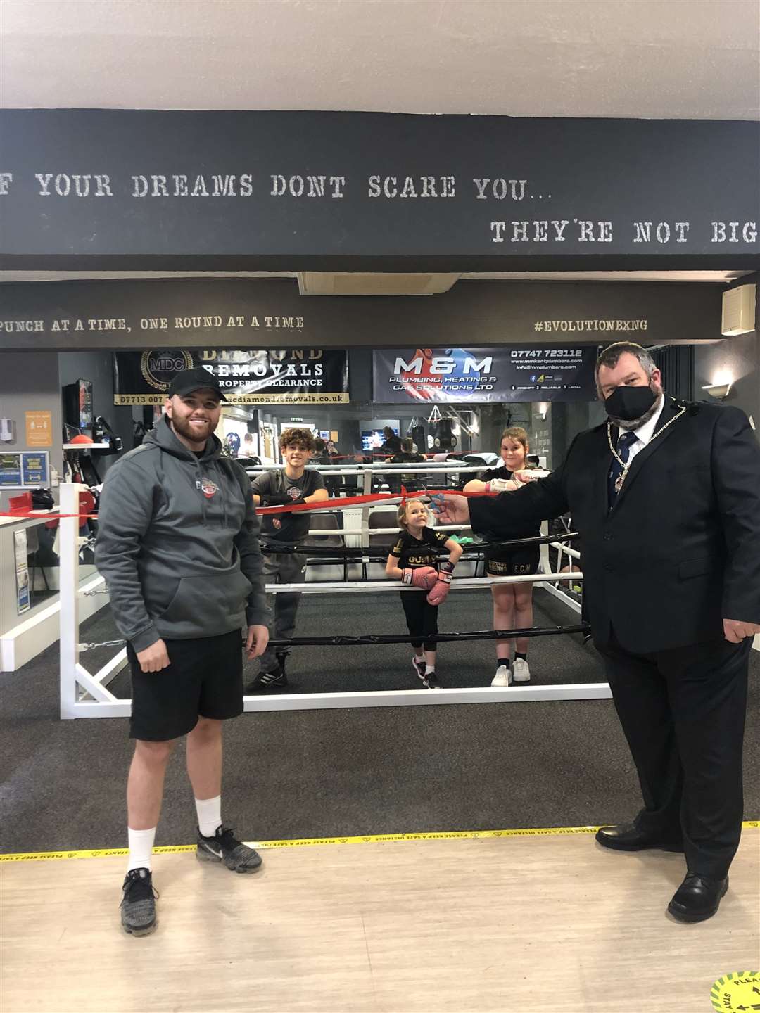 Deputy mayor Cllr David Cronk officially opens the new Evolution Boxing Gym at Deal Welfare Club. He is pictured with gym owner Mike Williams and young boxers Ben Broadhouse, Elliana Carr-Heath and Isabelle Carr.