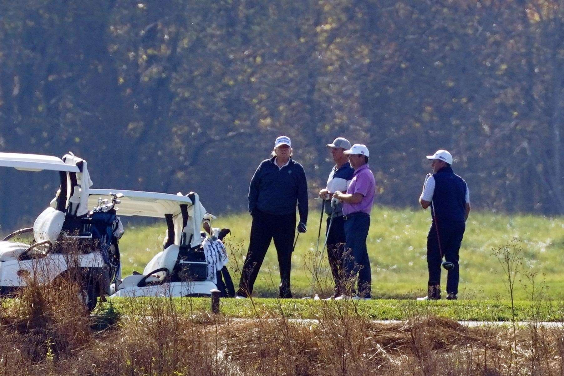 President Donald Trump played a round of golf at the Trump National Golf Course on Saturday morning (Patrick Semansky/AP)