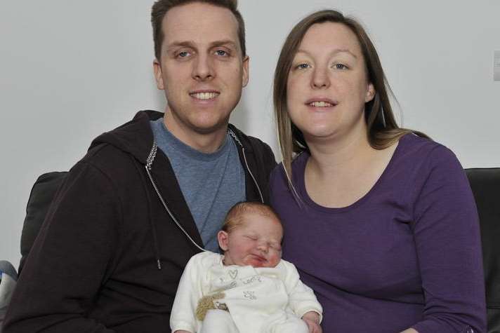 Dad Gary, Mum Antoinette with new baby Macey