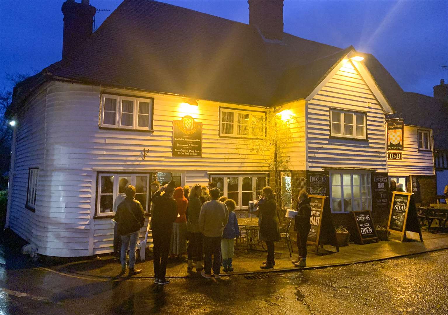 Paul Hollywood at a charity cake baking contest in The Chequers Inn, Smarden