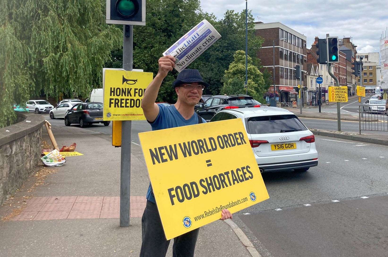 The Rebels on Roundabouts urged passing motorists to “honk for freedom”