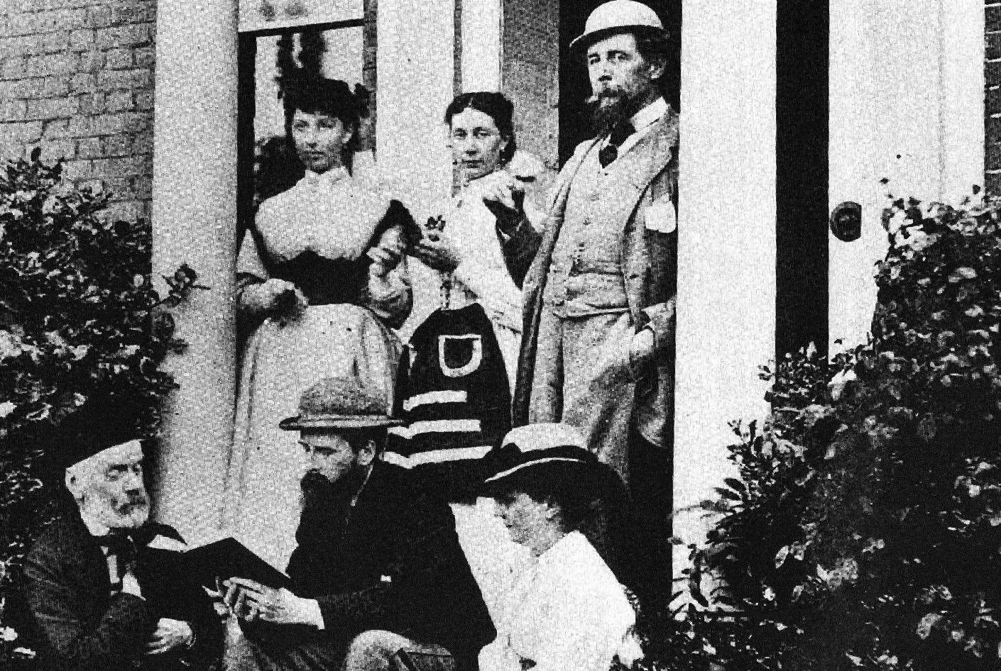 Charles Dickens, far right, in front of his Higham home - today it is Gad's Hill public school. Picture: Gad's Hill School