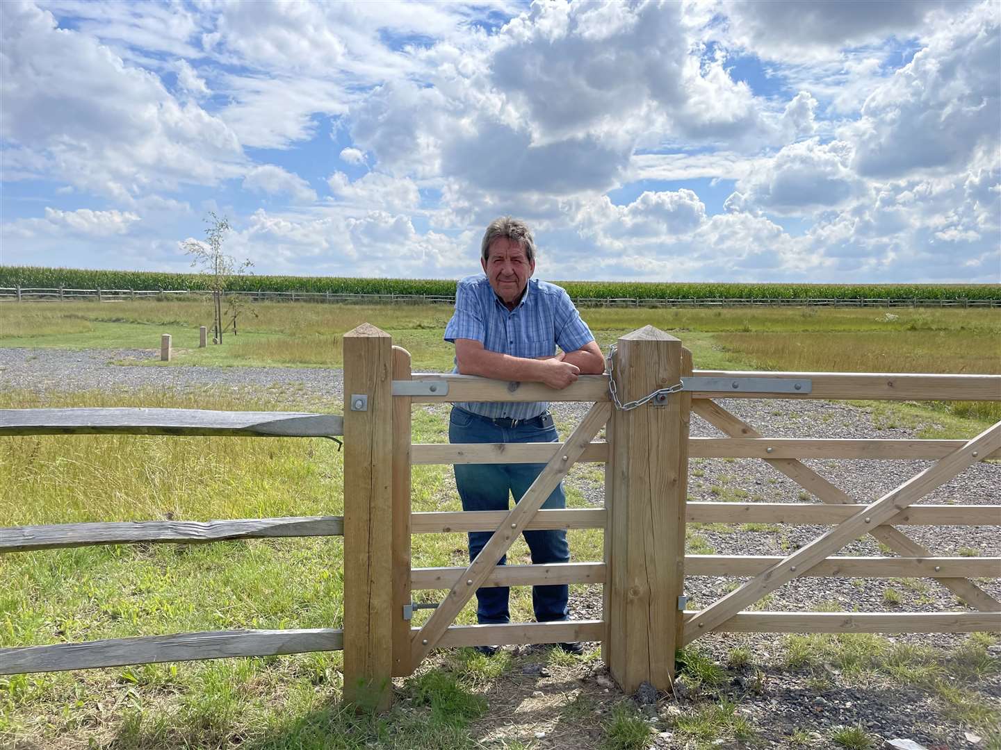 Sittingbourne and Sheppey MP Gordon Henderson at the site which is surrounded by open land