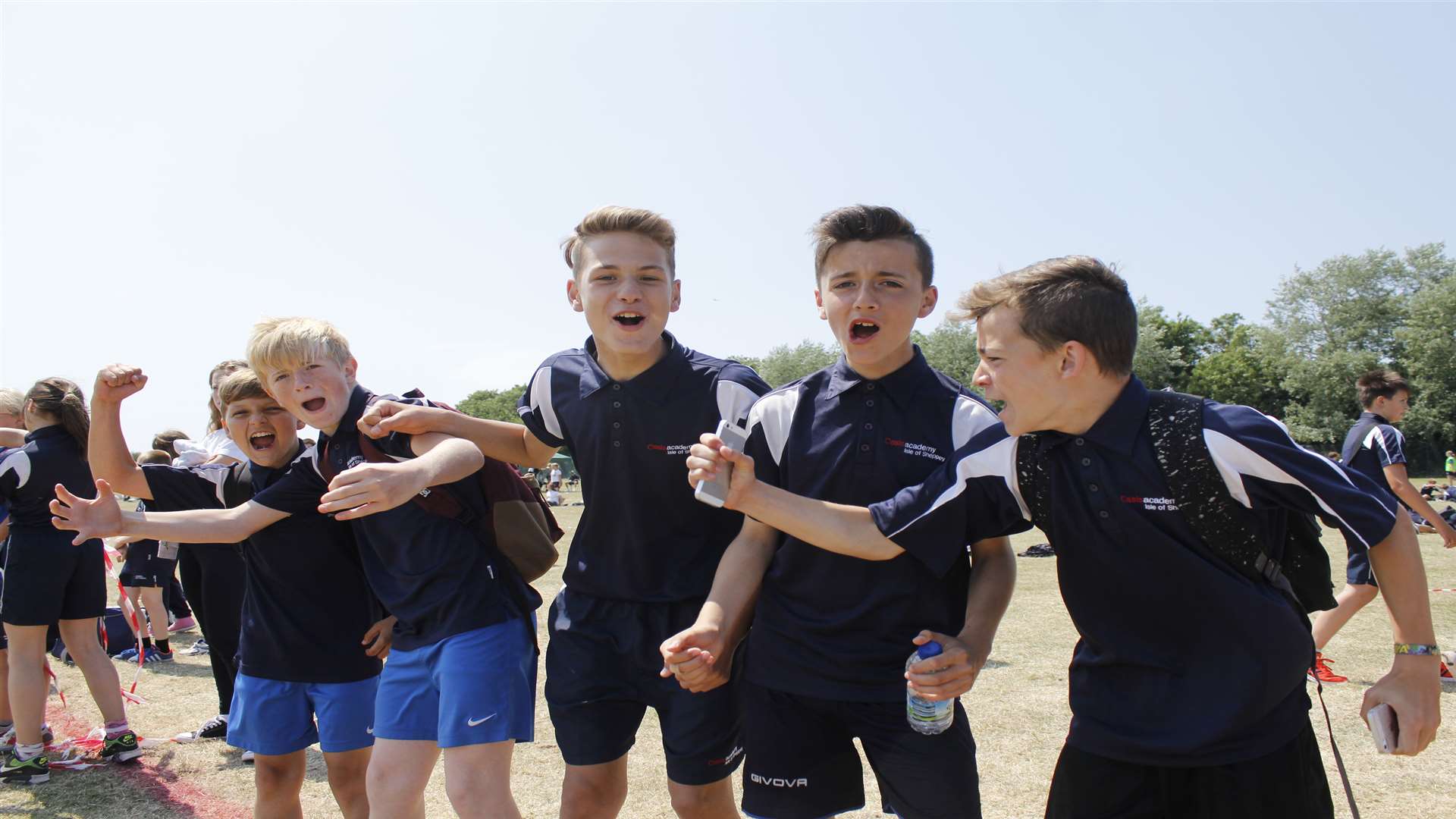 Youngsters cheer on their classmates