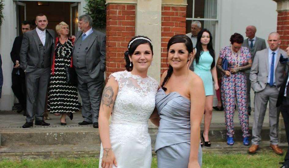 Ashleigh (left) on her wedding day, with her sister Stacie. (3004008)