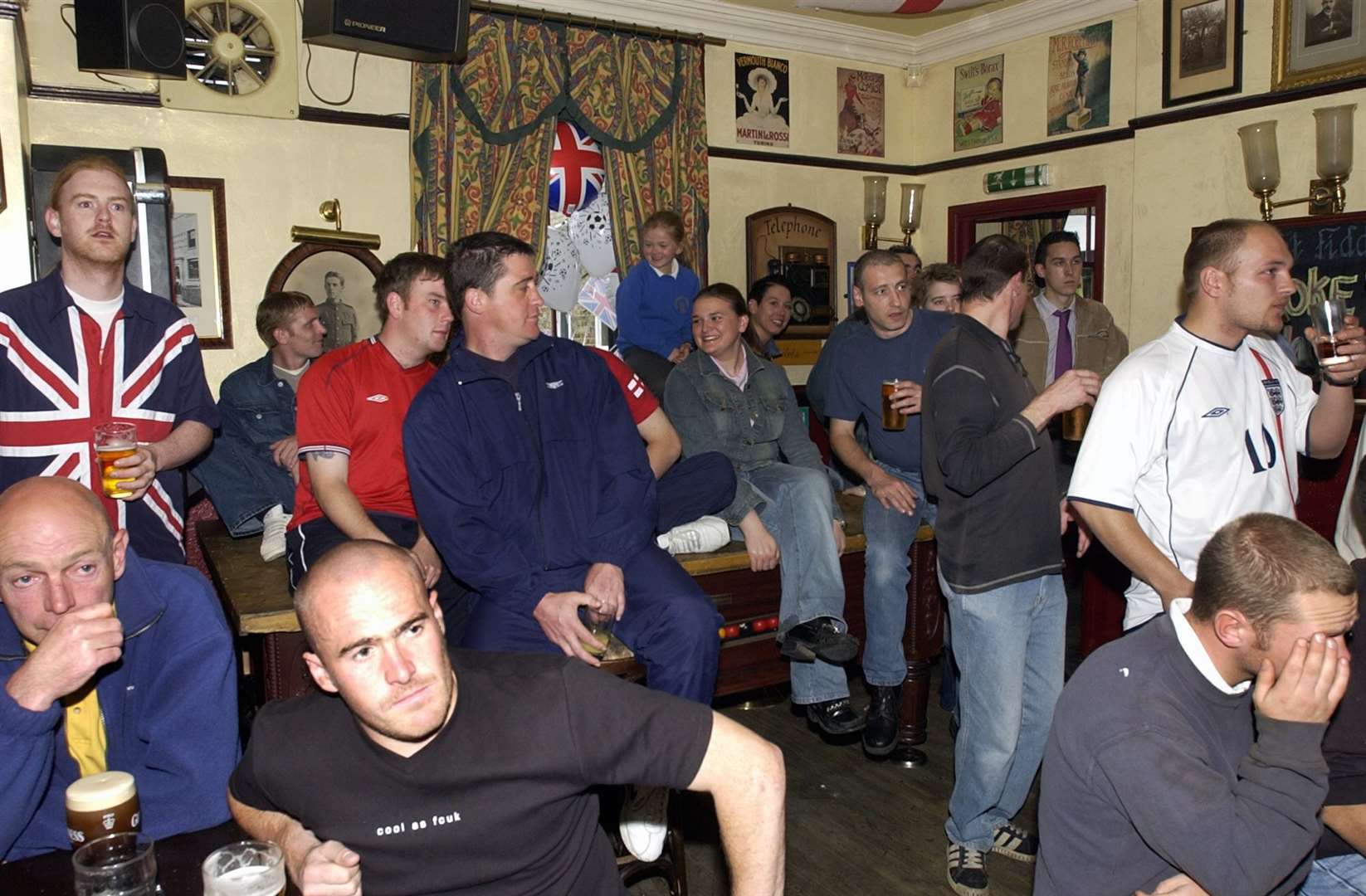 England fans at the Fat Fiddler in Station Road, Ashford, in 2002. Picture: Dave Downey